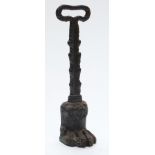 19th or early 20thC cast iron door porter/ stop with lion pad foot, height 35cm