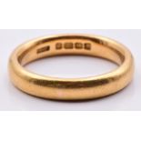 A 22ct gold wedding band/ ring, Birmingham 1924, 8.4g, size O/P