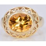 A 14ct gold ring set with a citrine in a geometric mount, 5.5g, size L