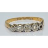 An 18ct gold ring set with diamonds, 2.2g, size O