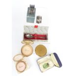 Two hallmarked silver napkin rings, a silver spoon, three Stratton compacts and a glass scent