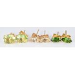 Three pairs of 9ct gold earrings set with tourmaline, quartz with rutile inclusions and peridot