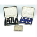 Two cased sets of hallmarked silver spoons, weight 89g, together with a silver plated cigarette case