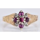 A 9ct gold ring set with diamonds and rubies, 2.7g, size K/L