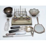 Hallmarked silver and plated items including hallmarked silver hand mirror, toast rack, standish,