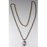 Victorian 9ct gold guard chain/ necklace made up of oval faceted links with an amethyst pendant,
