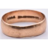 A 9ct rose gold wedding band/ ring, Chester 1909, 4.2g, size V