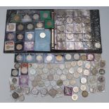 A large collection of modern crowns, £5 coins etc, some in an album, all contained in attache case