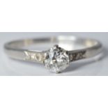 Art Deco platinum ring set with a diamond of approximately 0.3ct, with diamond encrusted