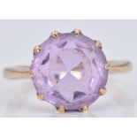 A 9ct gold ring set with a round cut amethyst, 3.3g, size H/I