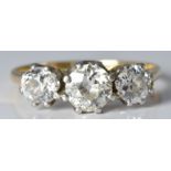 An 18ct gold ring set with three diamonds of approximately 0.6ct, 0.3ct & 0.3ct, 2.5g, size K