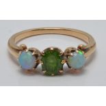 Victorian ring set with a demantoid garnet and two opals, size O