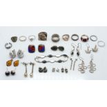 A collection of silver earrings and rings, 99g