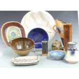 A collection of studio pottery including a large charger, vase with large improvised 'V', tray,