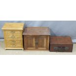 An oak cabinet, wooden box with leather handle and key and an apprentice style chest of drawers,