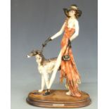 Santini Art Deco style figurine with dog on wooden base, H44cm