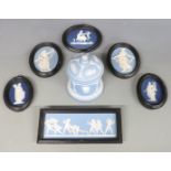 Wedgwood Jasperware plaques and a covered pot, tallest 13cm, rectangular plaque 6 x 17cm, oval 10