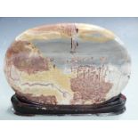 A polished agate tablet on stand, L33 x H26cm