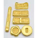 Six Chinese gold coloured metal trade tokens/ ingots