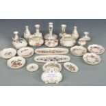 A collection of Zsolnay Pecs porcelain including trinket boxes, dishes, vases, Zsolnay advertising