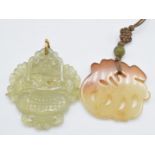Chinese jadeite pendant in the form of a vase and flowers and another hardstone pendant
