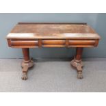 Victorian mahogany hall table with two drawers, raised on two tapering columns and four lion pad