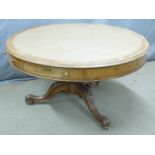 19thC oak circular leather inset oak drum or rent table raised on a scrolling tri-form base,