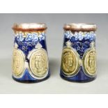A pair of Doulton Lambeth Queen Victoria Golden Jubilee commemorative tankards with hallmarked
