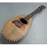 Italian round backed mandolin indistinctly signed to table, labelled Phebe inside, with bone