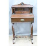 Late 19th/early 20thC mahogany bonheur du jour style desk with lyre shaped support raised on