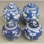 Two pairs of Chinese 19th/20thC covered ginger jars, one pair with six character mark to base,