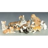 A collection of Lomonosov / USSR animal and bird figures, including a leopard, tiger etc, tallest