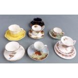 A large collection of miniature/collectable cups and saucers including Royal Albert, Royal