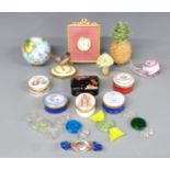 A collection of enamel boxes and novelty items including Kitney and Co clock, enamel globe,
