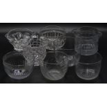 Eight cut glass wine rinsers and bowls, largest 14cm in diameter.