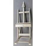 Large artist's easel with adjustable recline and screw adjustable height via handle to front and