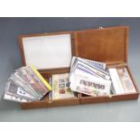 Over 100 Great Britain presentation packs, high redeemable value, in two wooden boxes