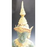 Thai bronze effect model of a semi-nude dancing lady mounted on wooden base, 73cm tall
