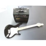 Behringer electric lead/rhythm guitar in black lacquered finish with contrasting white finger board,