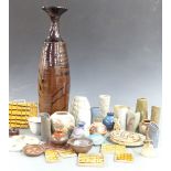 A collection of studio pottery including some impressed GMB, tiles, large vase, Wootton Courtenay