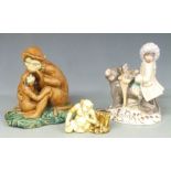 Three various monkey figures, tallest 28cm