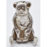 Chinese white metal pepper in the form of a bear or lemur with character marks to base, H5.5cm