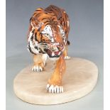 Royal Doulton Stalking Tiger HN 2646 mounted on an oval alabaster base, H14, L35cm