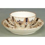 Caughley tea bowl and saucer with royal blue and gilt decoration
