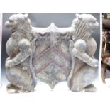 Large coat of arms flanked by two lions or mythical creatures, of polystyrene or similar