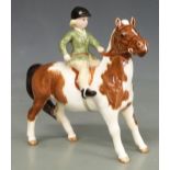 Beswick girl on a skewbald pony, H14.5cm Vendor agreed to re-enter with lower estimate