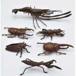 Six Japanese bronzes, a prawn and five beetles, largest 13.5 x 7 x 2.5cm