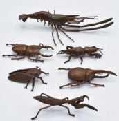 Six Japanese bronzes, a prawn and five beetles, largest 13.5 x 7 x 2.5cm