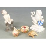 Nymphenburg griffin figure, Copenhagen figure and miniature Royal Worcester items, tallest 9cm