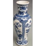 A 19thC Chinese blue and white vase, decorated with birds and peonies, four character mark to